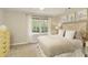 Bedroom features a large window, neutral decor, and plush carpet at 3719 Northbrook Ct, Atlanta, GA 30340