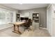 Bright home office with a large window, built-in bookshelves, and a spacious desk for remote work at 3719 Northbrook Ct, Atlanta, GA 30340