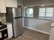 Modern kitchen features sleek stainless steel appliances, stylish countertops, and hardwood floors at 633 Tom Read Dr, Marietta, GA 30062