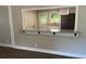 A view through the breakfast bar into a modern, remodeled kitchen at 633 Tom Read Dr, Marietta, GA 30062
