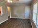 Living Room features wood floors, ceiling fan, natural light and open floor plan at 633 Tom Read Dr, Marietta, GA 30062