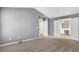 Bright bedroom offers plush carpet, natural light, and en suite bathroom access at 3704 Ramsey Sw Cir, Atlanta, GA 30331