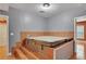 Indoor hot tub room with tile floor at 3704 Ramsey Sw Cir, Atlanta, GA 30331