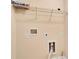 Laundry room showcasing hookups, wire rack shelf, and neutral paint at 3704 Ramsey Sw Cir, Atlanta, GA 30331