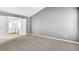 Spacious main bedroom with plush carpeting and an ensuite bathroom offering a serene and private retreat at 3704 Ramsey Sw Cir, Atlanta, GA 30331
