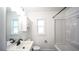 Bathroom featuring shower-tub combination and a modern sink at 4443 Toonigh Nw Rd, Acworth, GA 30101