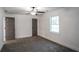 Bedroom featuring neutral carpet and two doors at 4443 Toonigh Nw Rd, Acworth, GA 30101
