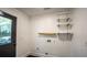 Laundry room with new shelves and space for appliances at 4443 Toonigh Nw Rd, Acworth, GA 30101