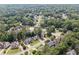 Aerial view of a neighborhood with mature landscaping and well-maintained homes at 5013 Kendall Nw Sta, Acworth, GA 30102
