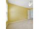 Yellow bedroom featuring a ceiling fan and natural light from the window at 5013 Kendall Nw Sta, Acworth, GA 30102