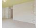 Spacious carpeted bedroom with neutral walls and trim with standard closet doors at 5013 Kendall Nw Sta, Acworth, GA 30102