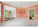 Dining room featuring a chandelier and access to the kitchen and living room at 5013 Kendall Nw Sta, Acworth, GA 30102