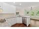 Bright kitchen with granite countertops, a gas cooktop, and stainless-steel appliances at 5013 Kendall Nw Sta, Acworth, GA 30102