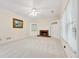 Living room with a ceiling fan, large window and a fireplace at 5013 Kendall Nw Sta, Acworth, GA 30102