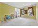 Living room boasts neutral carpet and large windows at 5013 Kendall Nw Sta, Acworth, GA 30102
