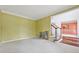 Spacious living room featuring neutral carpet and a view into the dining room at 5013 Kendall Nw Sta, Acworth, GA 30102
