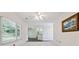 Open living space with large windows and view into the kitchen at 5013 Kendall Nw Sta, Acworth, GA 30102
