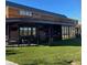 Modern restaurant exterior with outdoor seating and lush lawn at 5013 Kendall Nw Sta, Acworth, GA 30102