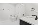Neutral powder room featuring a black faucet, marble countertop, and hex tile floor at 590 Arthur Rd, Canton, GA 30115