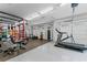 Brightly lit home gym featuring ample space and a range of fitness equipment at 590 Arthur Rd, Canton, GA 30115