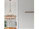 Hallway boasts a decorative wrought iron railing and vintage chandelier at 590 Arthur Rd, Canton, GA 30115