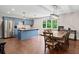 Eat in kitchen featuring stainless steel appliances, an island, and a dining table at 590 Arthur Rd, Canton, GA 30115