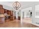 Gourmet kitchen with a brick backsplash, island, and stainless steel appliances at 590 Arthur Rd, Canton, GA 30115