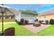 The landscaped backyard has an outdoor seating area that is perfect for relaxing or entertaining at 933 Capitol View Nw Ave, Atlanta, GA 30318