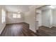 Open-concept living space with modern wood floors, neutral walls, and ample natural light at 933 Capitol View Nw Ave, Atlanta, GA 30318