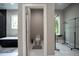 Elegant bathroom featuring a toilet in a private room, glass shower, and standalone tub at 1099 Vista Ne Trl, Atlanta, GA 30324