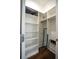 Bright and airy walk-in closet offering shelves and hanging space for organized storage at 1099 Vista Ne Trl, Atlanta, GA 30324