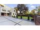 Modern home with a three-car garage, professionally landscaped yard, and a long driveway leading to the property at 1099 Vista Ne Trl, Atlanta, GA 30324