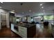 Spacious floor plan with a kitchen, pool table, and modern living room furniture at 1099 Vista Ne Trl, Atlanta, GA 30324