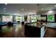 Spacious open floor plan living room adjacent to kitchen with hardwood floors at 1099 Vista Ne Trl, Atlanta, GA 30324
