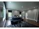 Bright main bedroom with a sitting area, a large window, and hardwood flooring at 1099 Vista Ne Trl, Atlanta, GA 30324