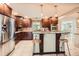 Modern kitchen boasts stainless steel appliances, granite countertops, and a breakfast bar with stylish seating at 1652 Tryon Ne Rd, Atlanta, GA 30319