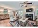 Inviting living room featuring a fireplace, hardwood floors, and neutral decor at 1652 Tryon Ne Rd, Atlanta, GA 30319
