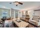 Bright and airy living room with hardwood floors, comfortable seating, and plenty of natural light at 1652 Tryon Ne Rd, Atlanta, GA 30319