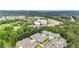 Community aerial view highlighting the proximity to a commercial area and lush greenery at 18 Mary Ne Ln, White, GA 30184