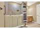 Bathroom featuring walk-in tub with patterned shower curtain and tile surround at 18 Mary Ne Ln, White, GA 30184