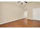 Bedroom featuring hardwood floors, neutral paint, vaulted ceiling, and ceiling fan at 18 Mary Ne Ln, White, GA 30184