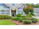 Close up of a charming single-Gathering home with beautifully landscaped front yard at 18 Mary Ne Ln, White, GA 30184