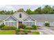 Charming single-Gathering home with well-manicured landscaping, attached garage, and beautiful curb appeal at 18 Mary Ne Ln, White, GA 30184