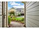 Charming exterior view of a home with landscaped yard and inviting entrance from an open doorway at 18 Mary Ne Ln, White, GA 30184