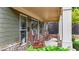 Charming front porch with rocking chairs and stone accents offers a relaxing outdoor space at 18 Mary Ne Ln, White, GA 30184