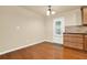 Cozy breakfast area featuring granite countertops and hardwood floors, bathed in natural light from nearby windows at 18 Mary Ne Ln, White, GA 30184