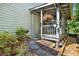 Outdoor patio area featuring a grill and access to the screened-in deck at 18 Mary Ne Ln, White, GA 30184