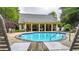 Beautiful community pool with a surrounding sundeck and attractive clubhouse at 18 Mary Ne Ln, White, GA 30184