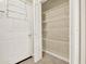 Convenient storage with shelving adjacent to the interior door at 18 Mary Ne Ln, White, GA 30184
