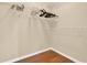 Walk-in closet with white wire shelving and hardwood floors at 18 Mary Ne Ln, White, GA 30184